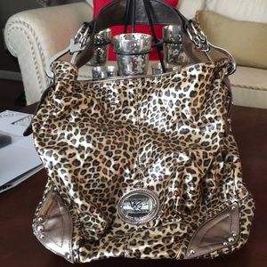 Kathy Van Zealand Brown animal print bucket bag